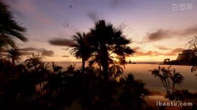 海岸线上的热带岛屿酒店和日落时的游艇